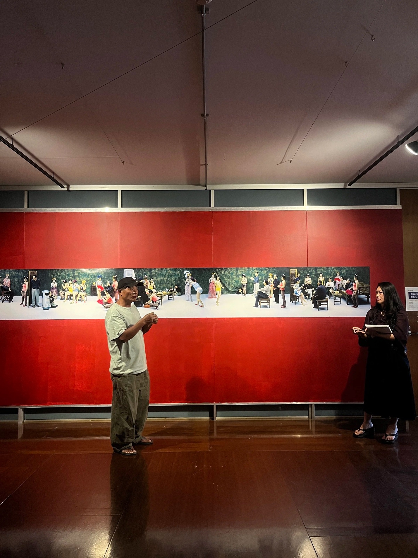 Wang Qingsong discussing his work at UWA’s Cullity Gallery, 2025. Photograph taken by author.
